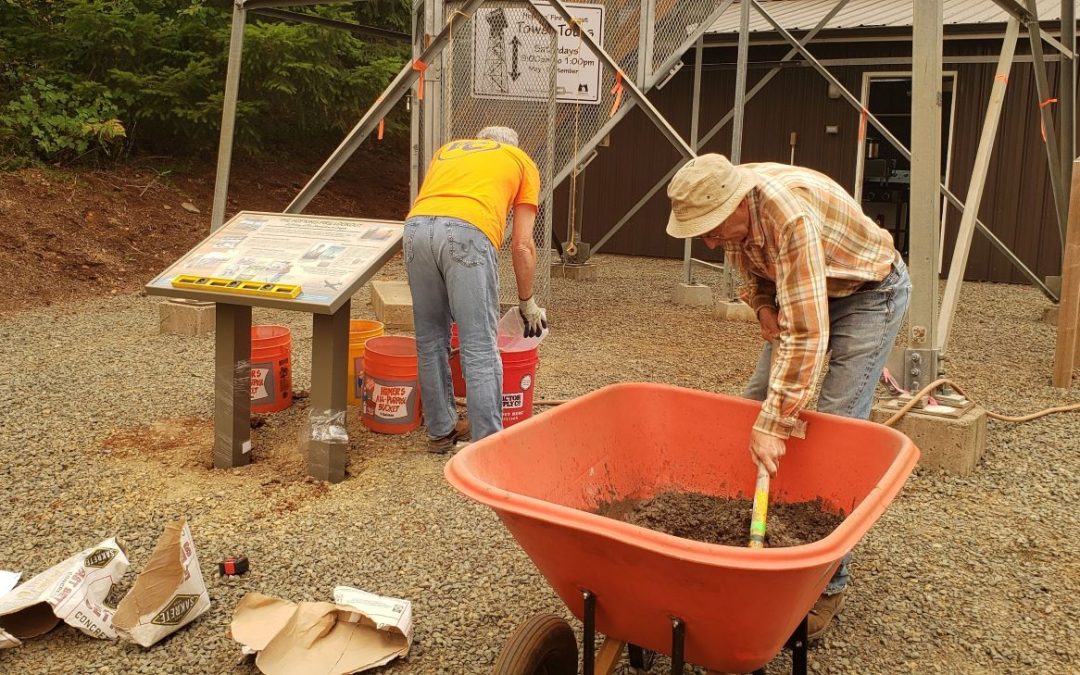 Volunteers working on The Hopkins Fire Lookout grounds