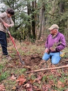 pictures of elementary school children helping plant trees at Hopkins Demonstration forest with Mike Biondi, Cliff Puckett, and other volunteers.
